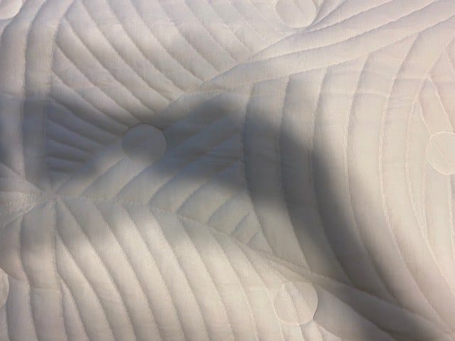 Close-up of the quilted knit cover